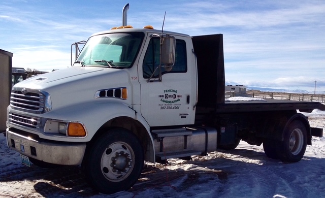 K BAR D flatbed truck ready for hauling and site work