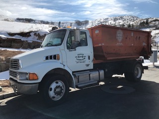 Roll-off dumpster delivery